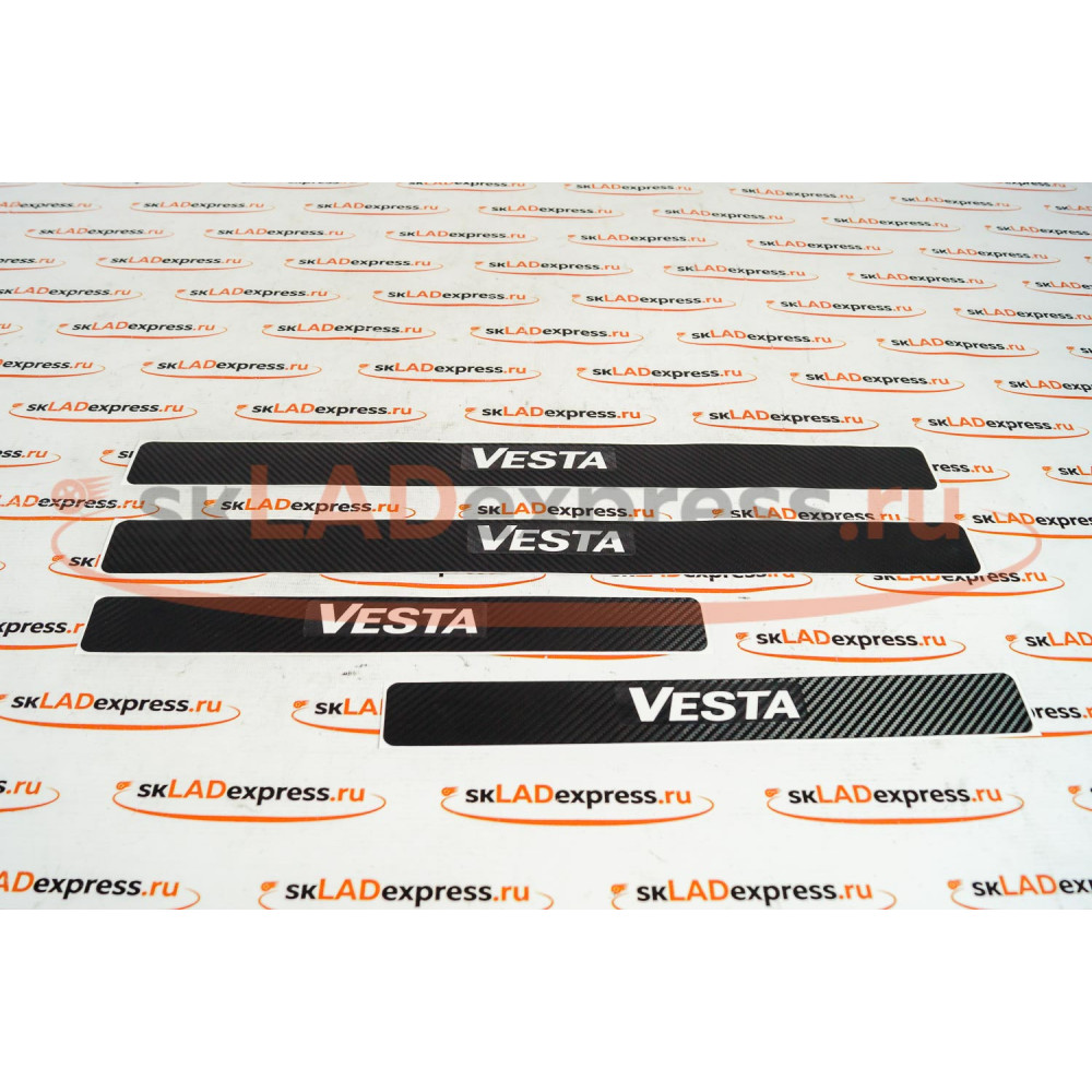 Наклейки на пороги карбоновые с надписью Vesta на Лада Веста